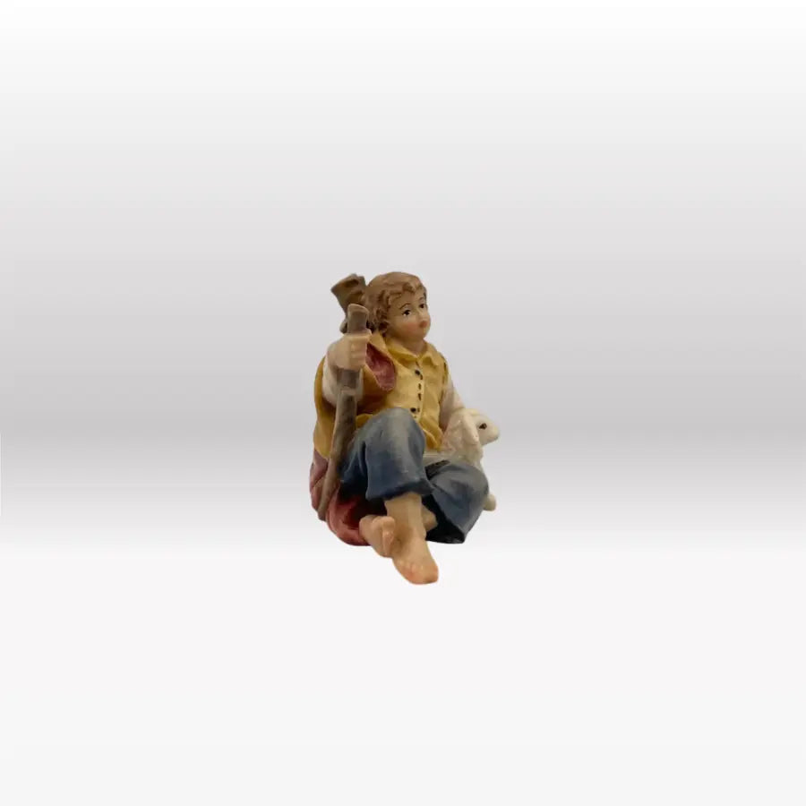 Jetzt kaufen Shepherd boy lying nativity figure from Heimatkrippe