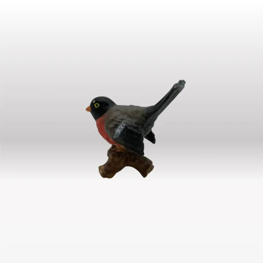 Vogel auf Ast (rot/gelb) von Heimatkrippe-1